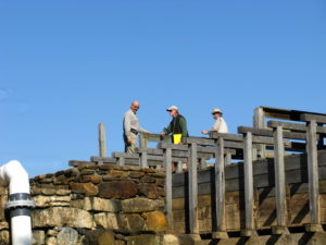 YMA Board members looking over repairs