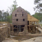 In 1999, the south side of Yates Mill was still being restored to prepare for the waterwheel to be attached.